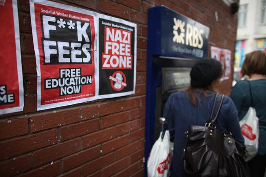 Students arriving for Manchester University's freshers week queue up at a cash machine to draw money on Sept. 22, 2009, in Manchester, England.